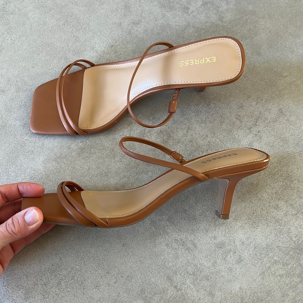 Express strappy heels, runs big. Tan strappy heels
